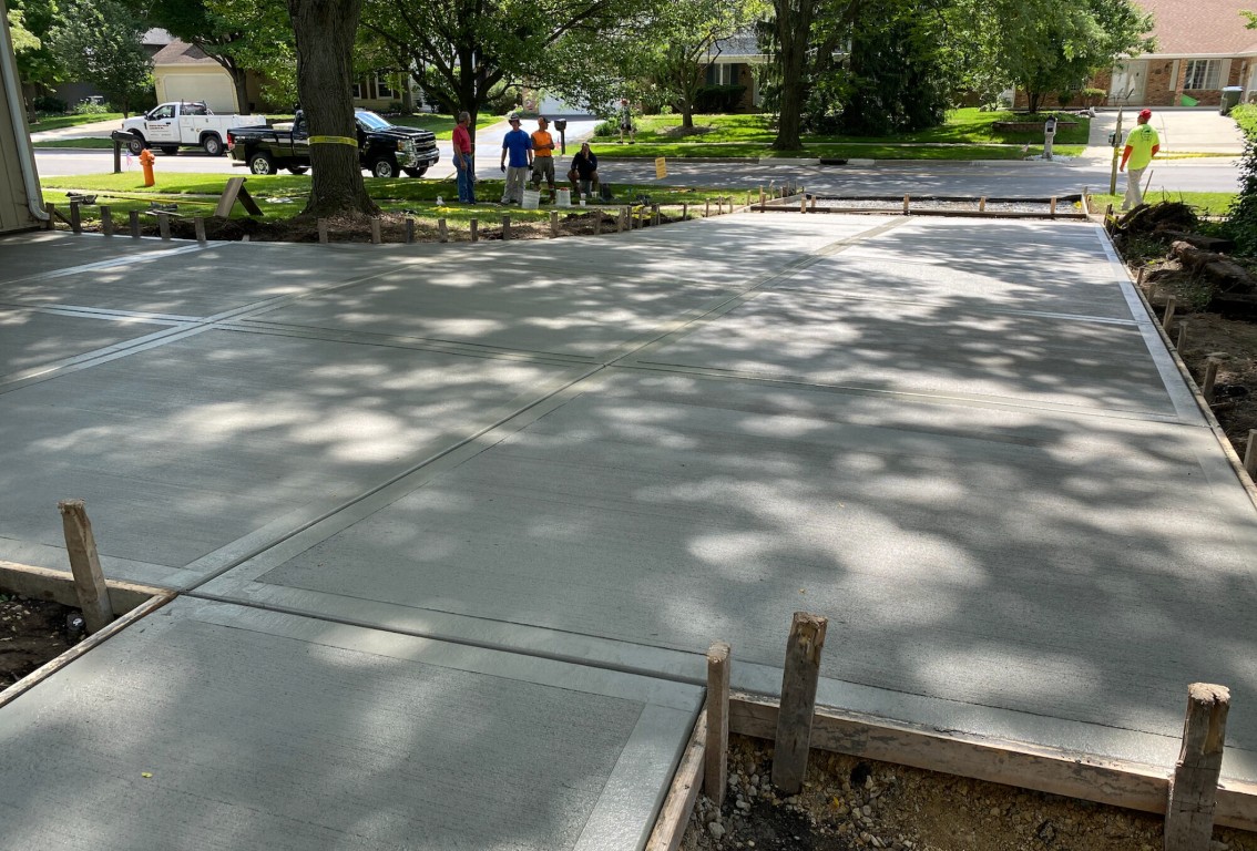 Expert driveway installation showing proper techniques